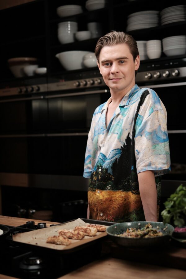 A photo of Ryan Riley in his kitchen
