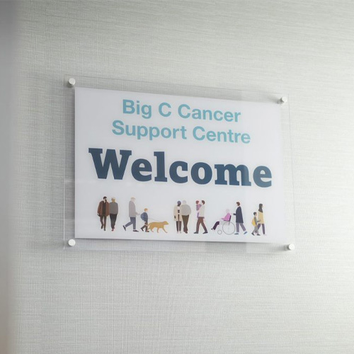 A close-up image of the welcome sign to the Big C support centre.