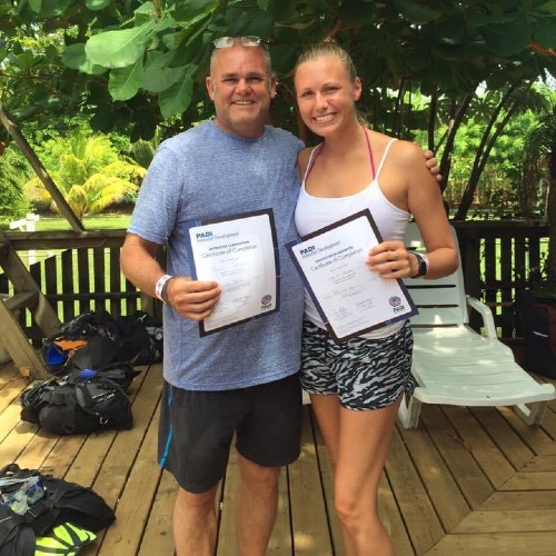 Lisa and Vearnon in 2015 when they completed their scuba diving Instructor Development Course in Utila, Honduras.