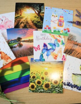 A collection of brightly coloured greetings cards