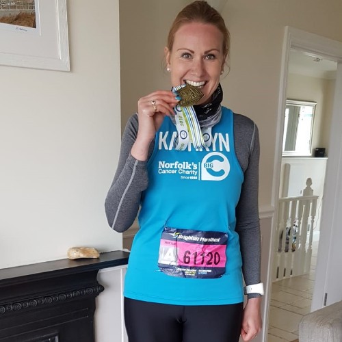 Service User Kathryn having completed the Brighton Marathon showing off her medal