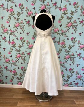 Back of cream tea length dress