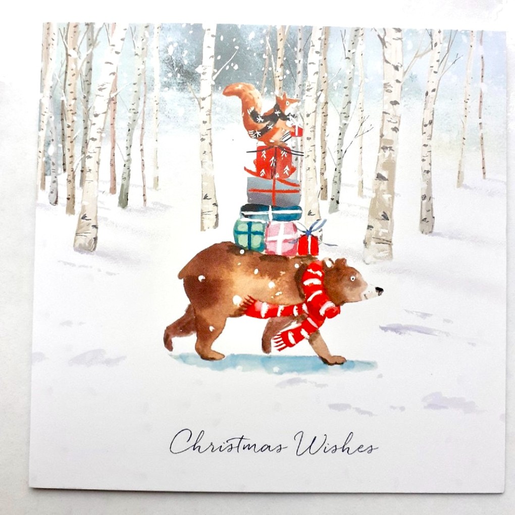 Pack of ten Christmas cards with an animal illustration on the front carrying presents.